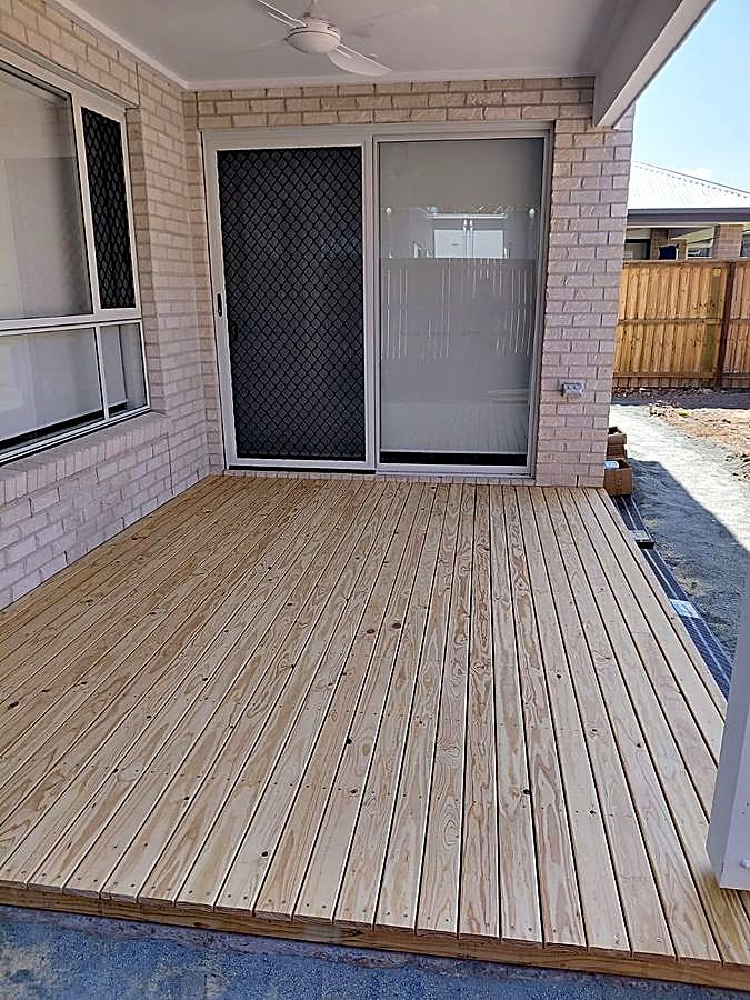Timber deck off a back sliding door