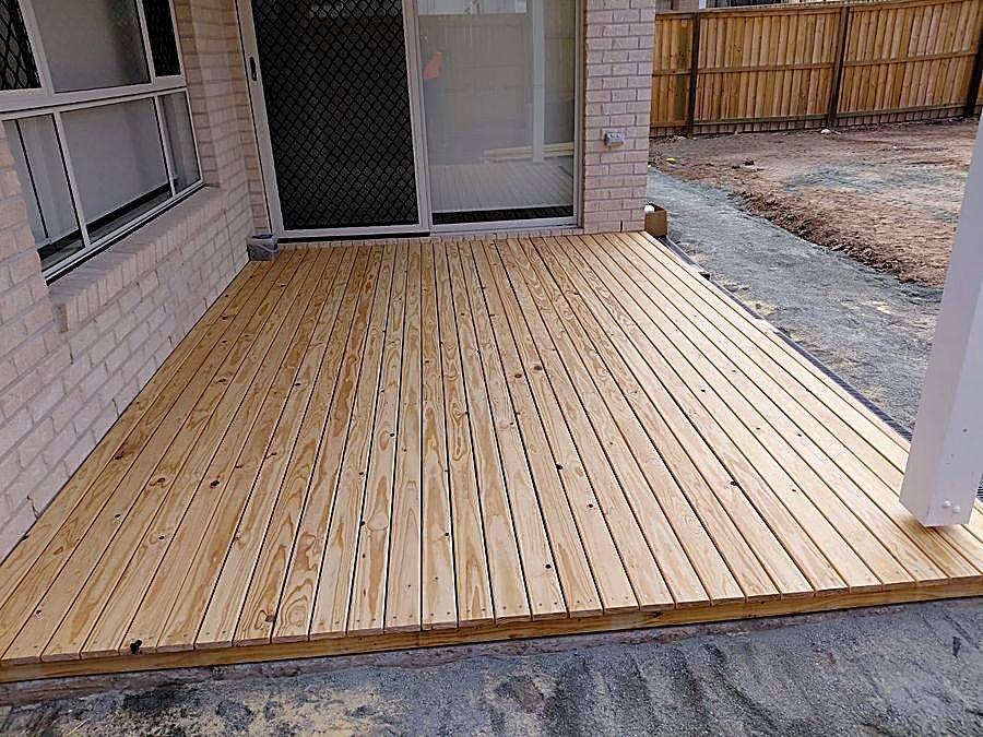 Finished timber deck off the back of a house
